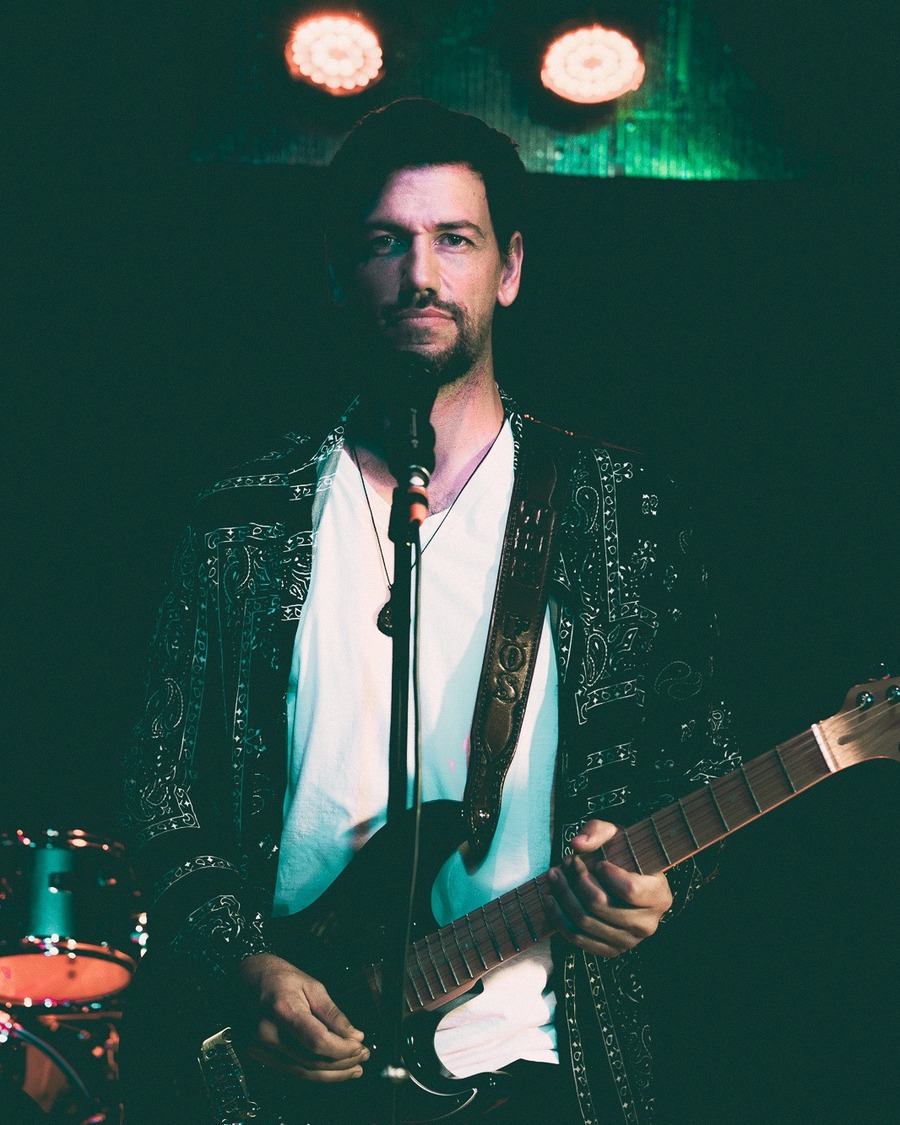 Vocalist and guitarist performing