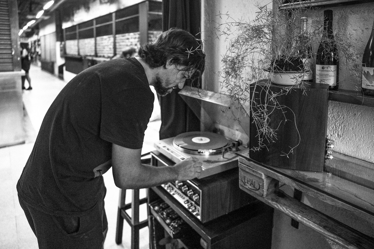 A candid analog photograph at a record player